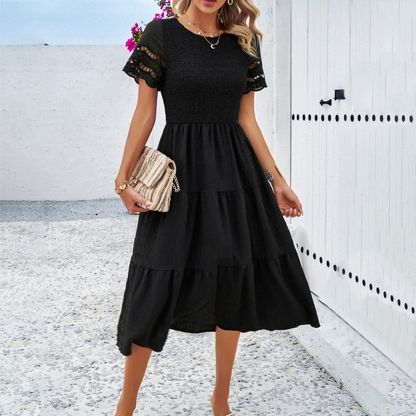 Spring and summer solid color temperament with a pleated hollow dress