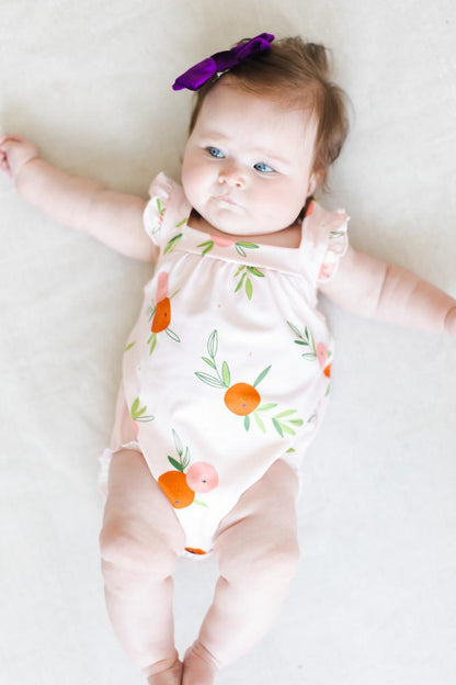 Tangerine Ruffle Cross Back Romper