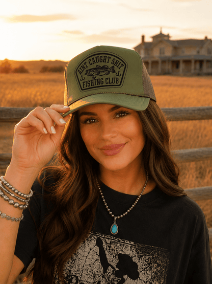 Aint Caught Shit Fishing Club Trucker Hat